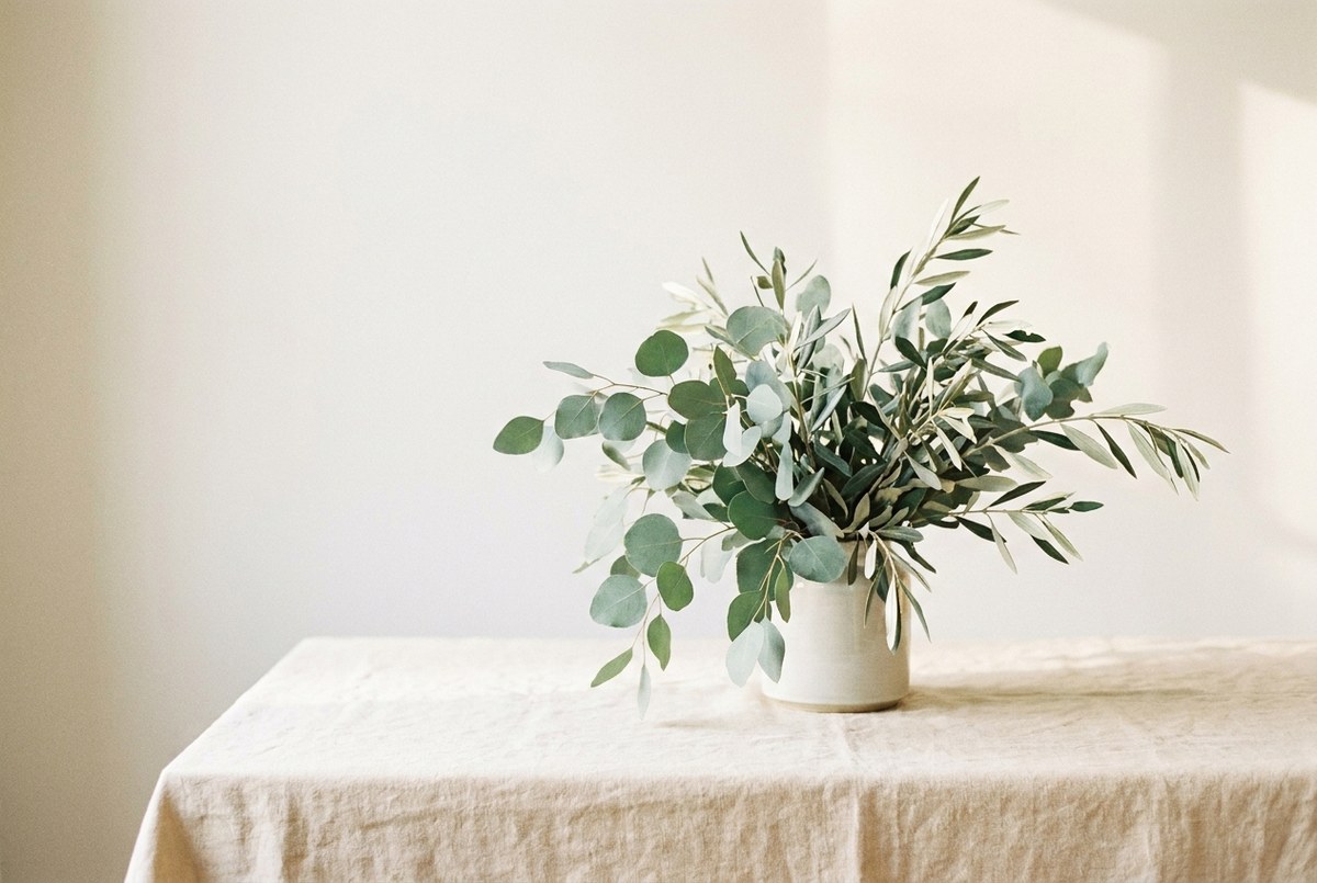 Eucalyptus and olive branches in a vase